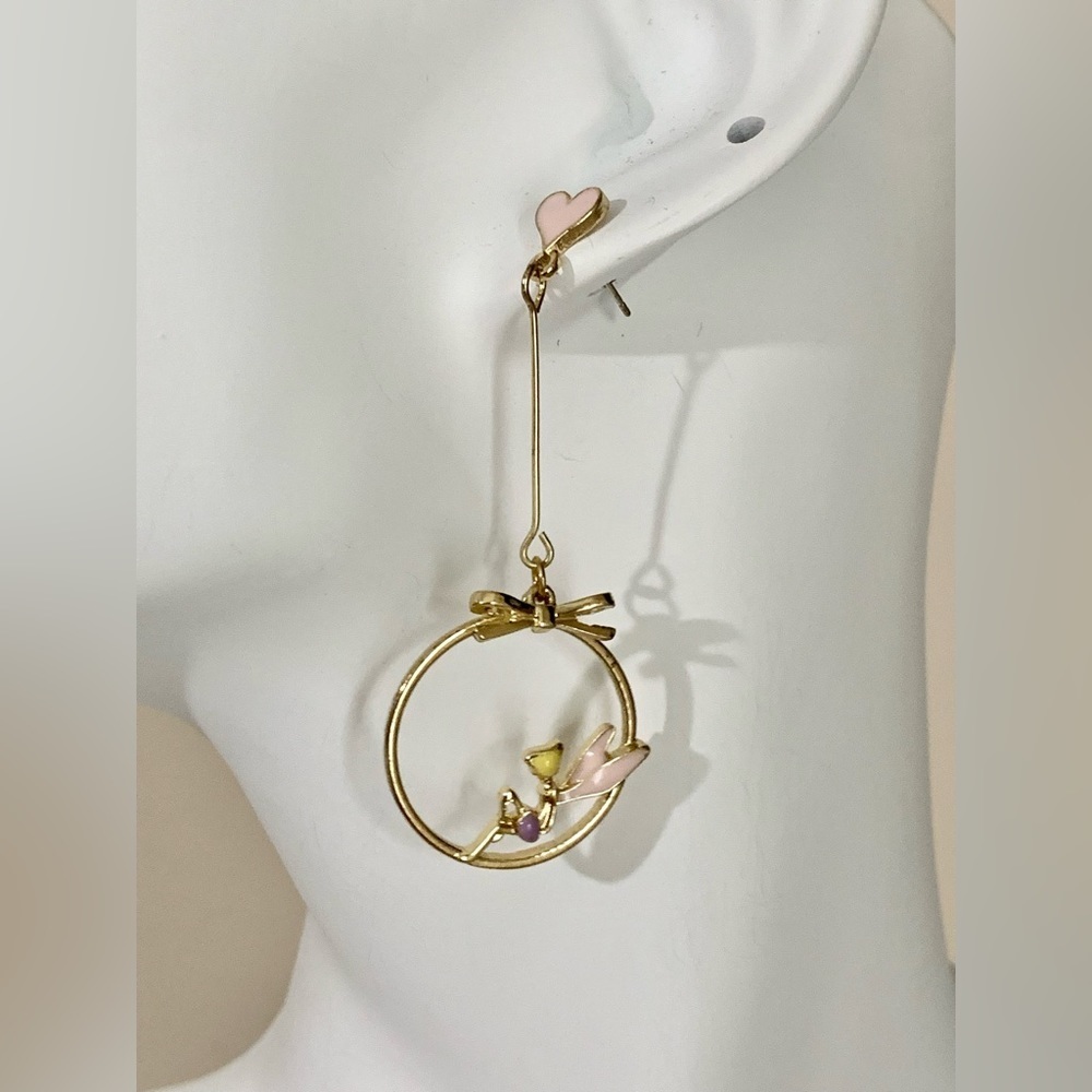 Fairy dangle earrings. Different length unique and fun.